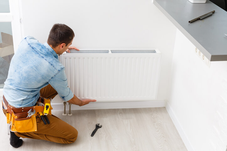 Where is the best place to put a radiator in a Room?